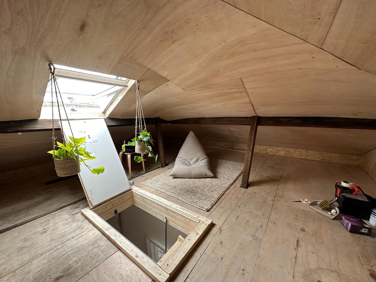 Finished loft conversion interior with Velux skylight