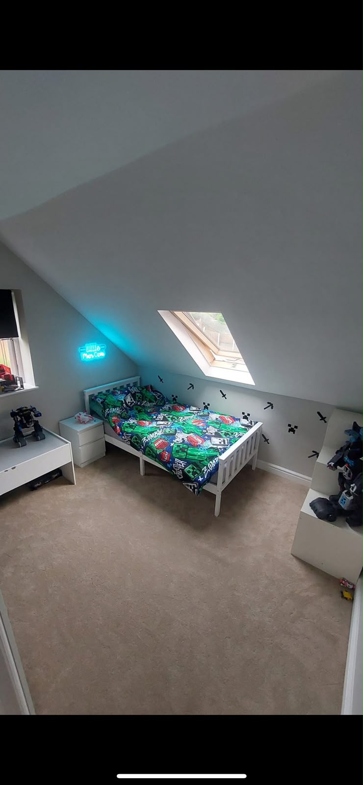 Finished loft children's bedroom with skylight