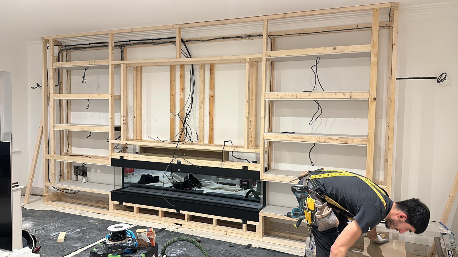Media wall stud framework during construction