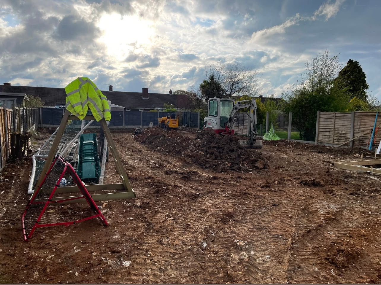 Rear garden site clearance with mini excavator and dumper