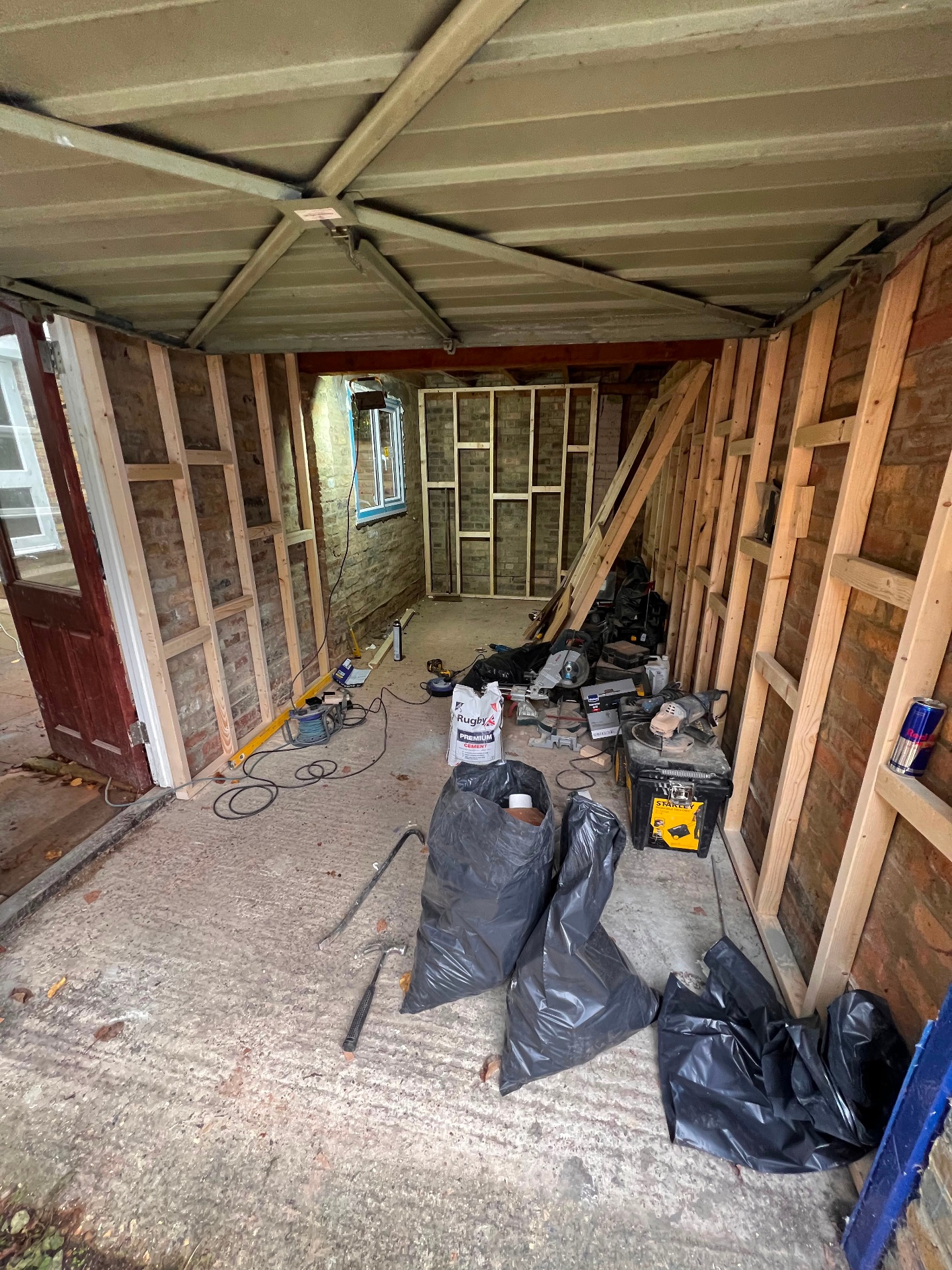 Garage conversion first fix with new stud walls and timber framing