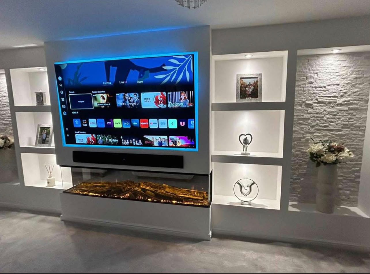 Contemporary media wall with backlit alcoves