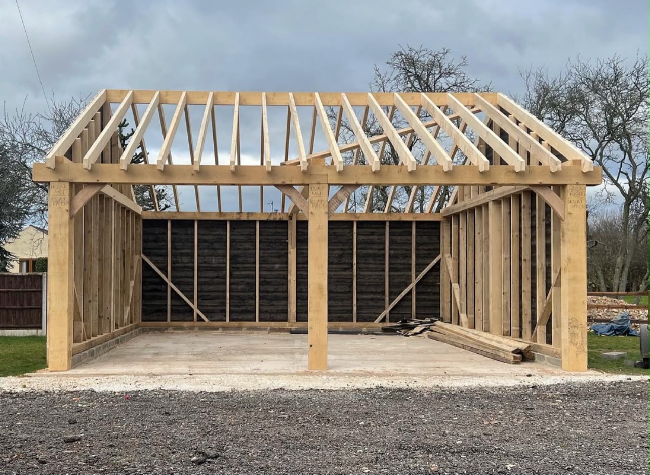 Timber-framed double garage build in progress